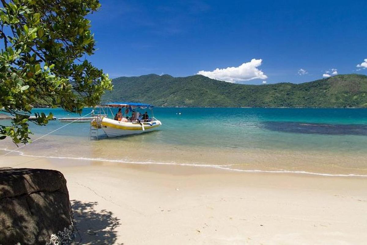 a boat in the water on a beach