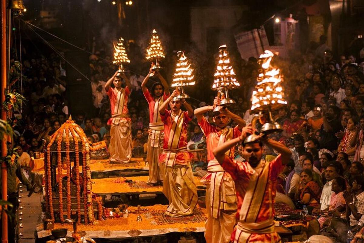 a group of men performing a show in front of a crowd