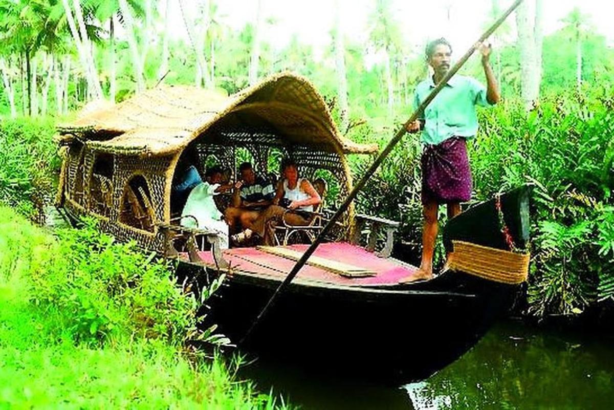 a group of people on a boat in the water
