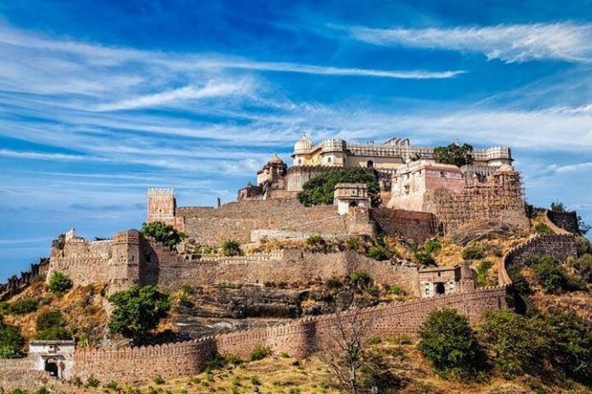 a castle perched on top of a mountain