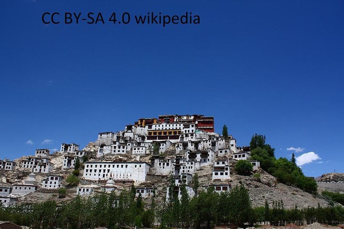 a group of buildings on top of a mountain
