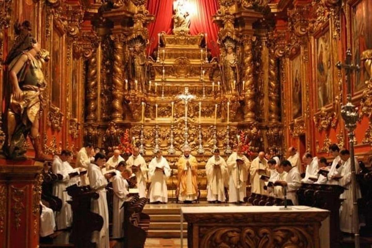 a group of people standing in a church