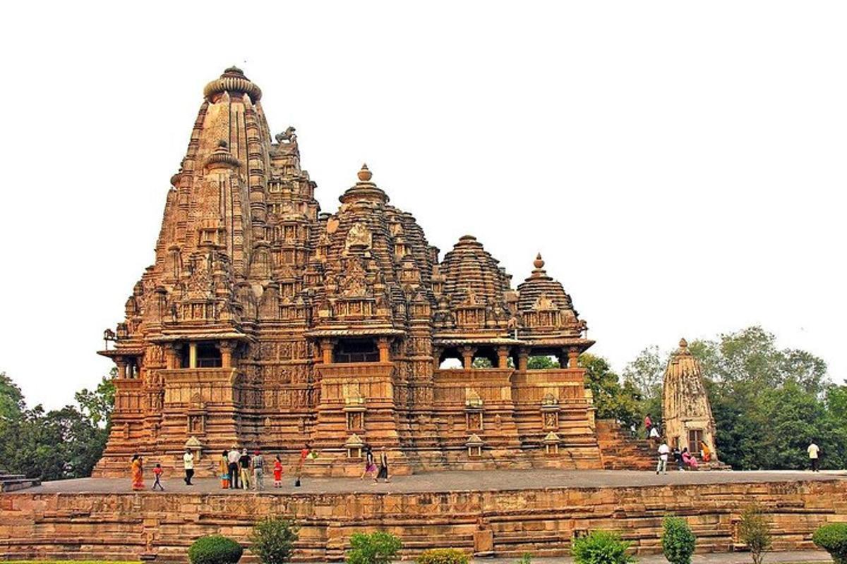 a large building with people standing in front of it