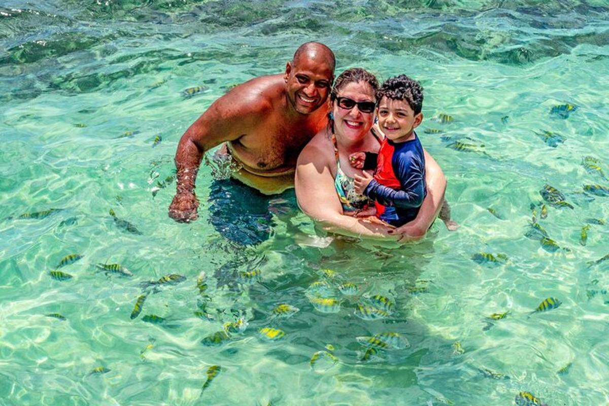 a man and a woman and a child in the water