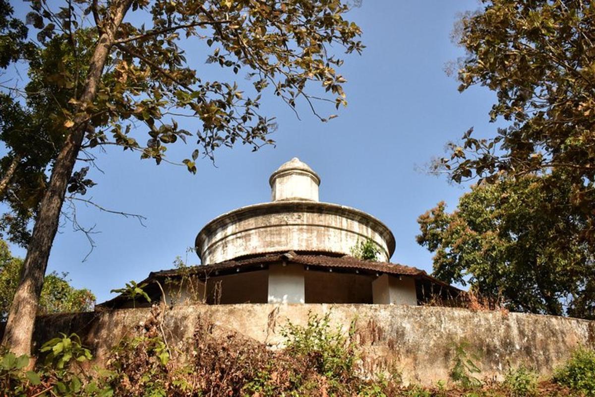 a building with a dome on top of a wall
