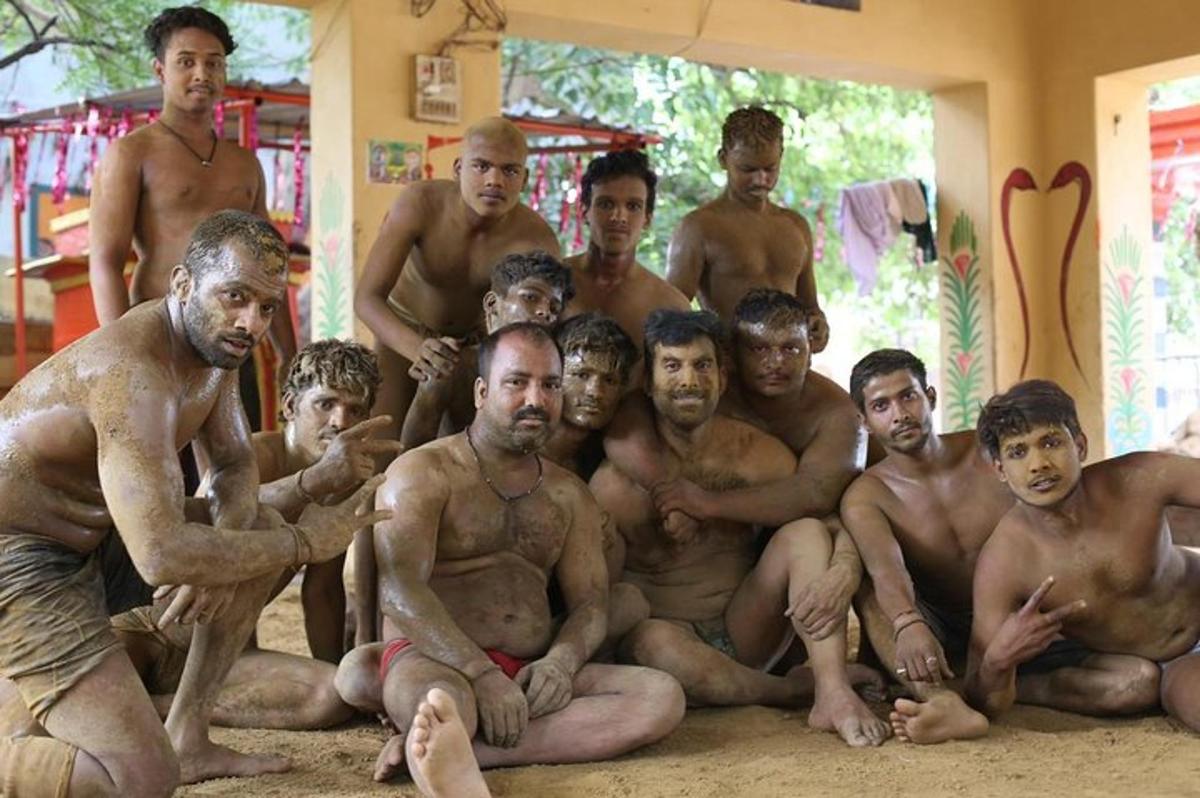 a group of naked men posing for a picture
