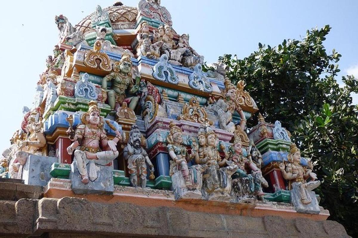 a group of figurines on top of a building