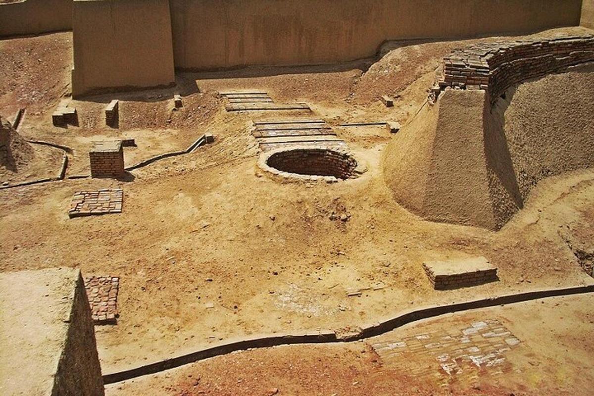 an ancient room with a hole in the floor