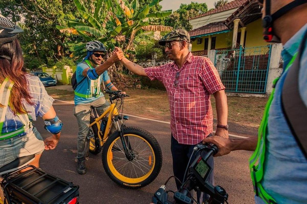 a man is giving another man a high five