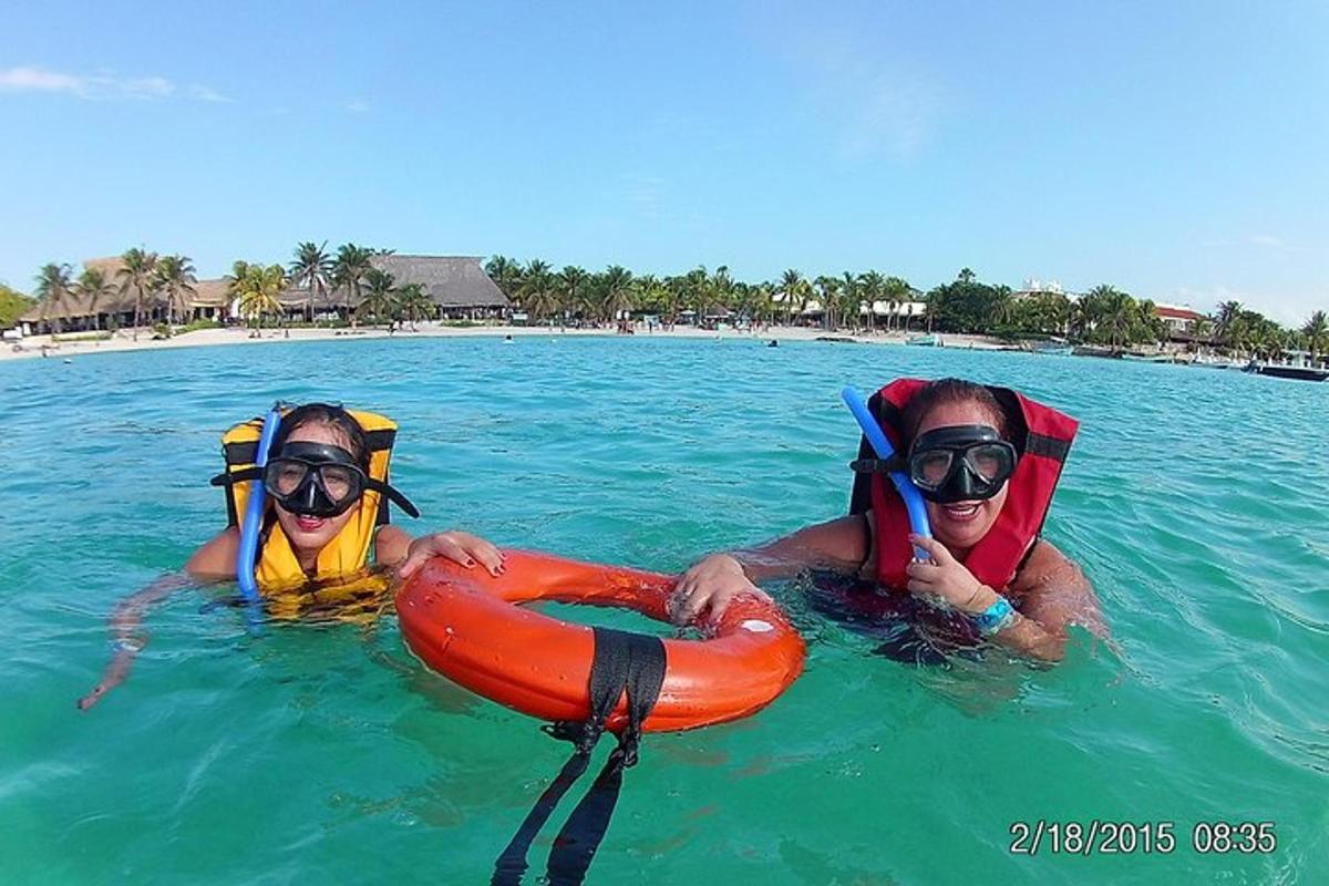 two people in the water in the ocean