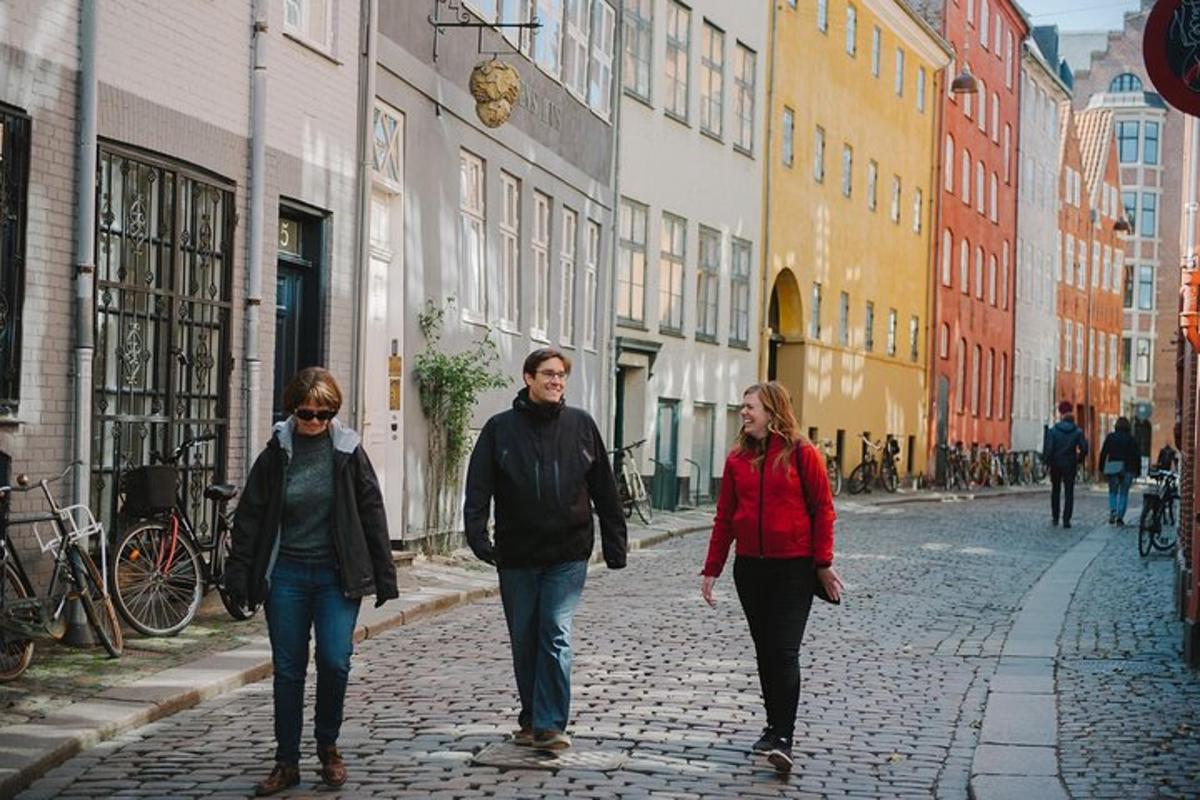 a group of people walking down a street