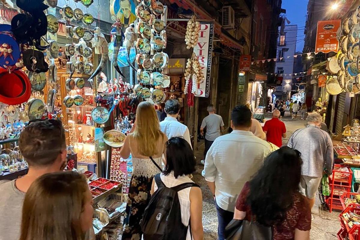 a group of people walking through a market
