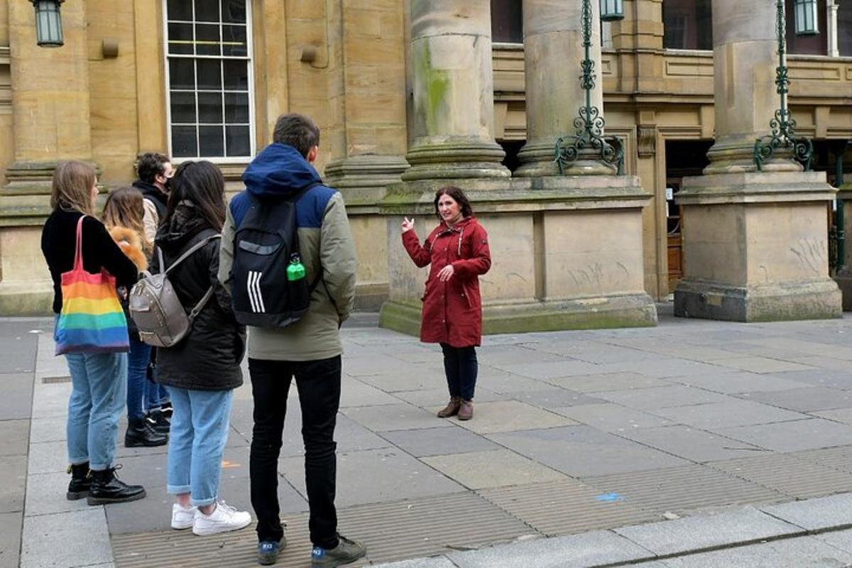 a group of people standing in front of a building