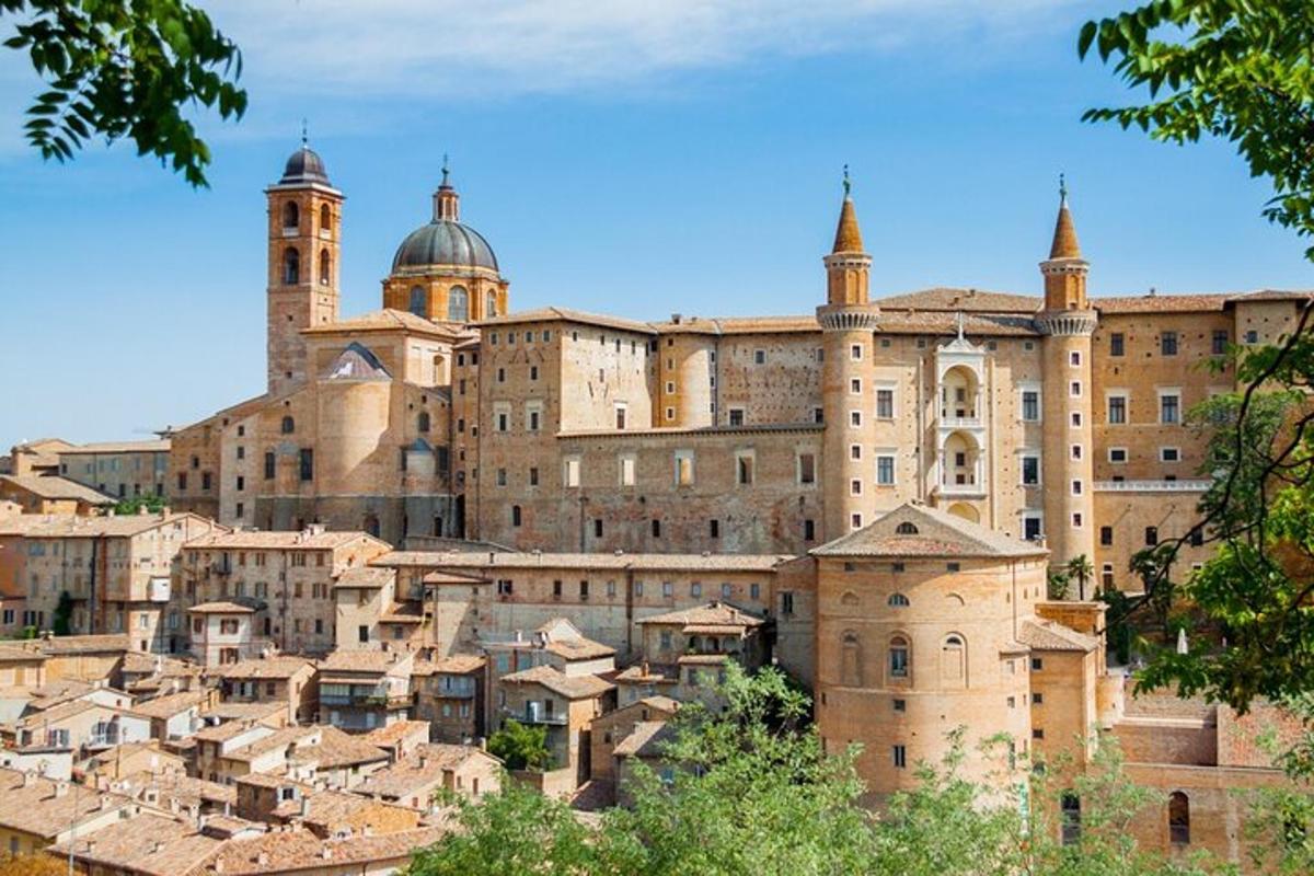 a large building with domes on top of a city