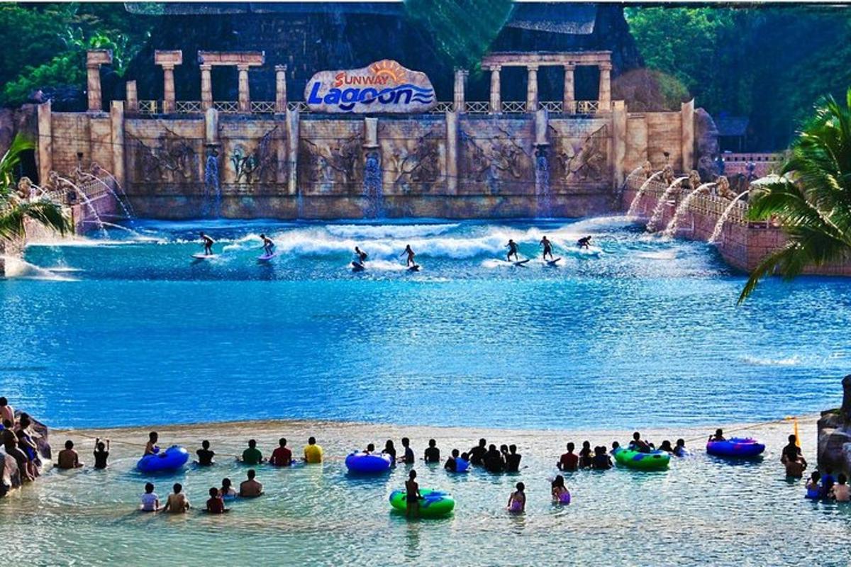 a group of people in the water at a water park