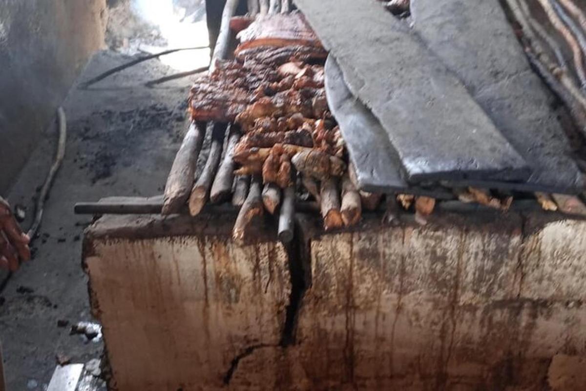 a bunch of food on top of a grill