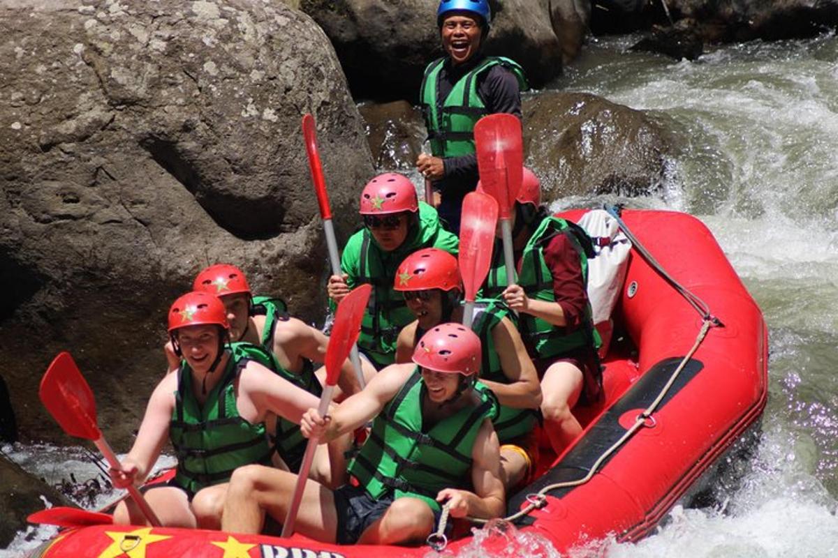 a group of people in a raft on a river