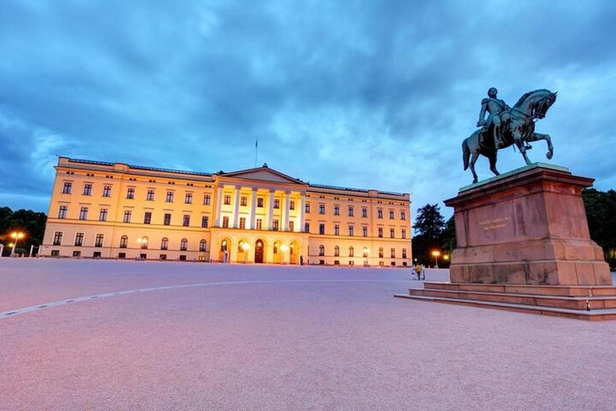 a statue of a man on a horse in front of a building