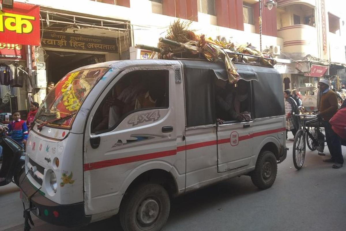 a white van parked on a street with a bike
