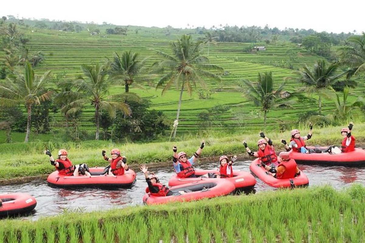 a group of people rafting down a river