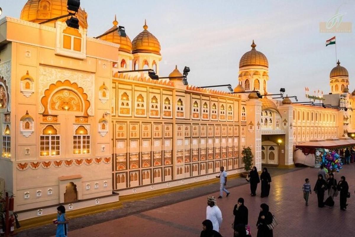 a large building with people walking in front of it