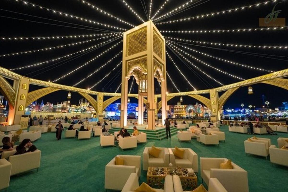 a large event venue with white couches and lights