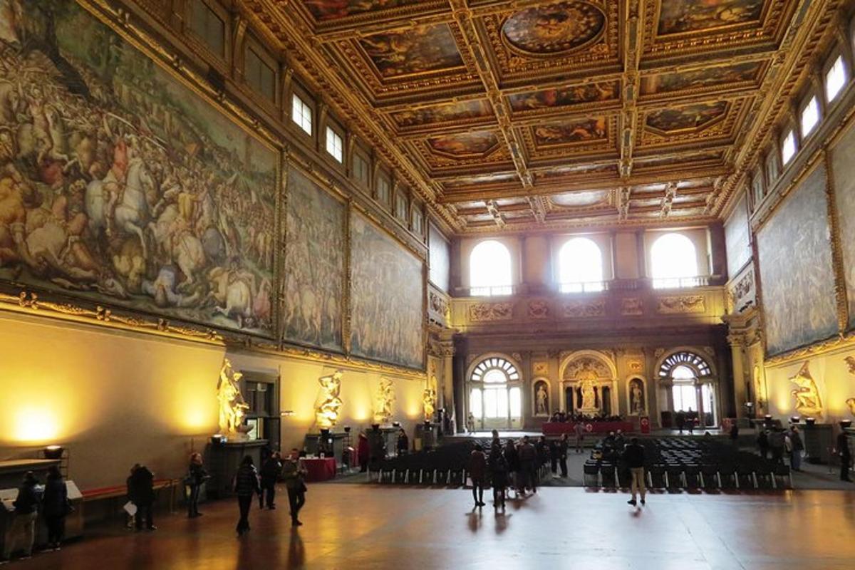 a large room with a large painting on the wall
