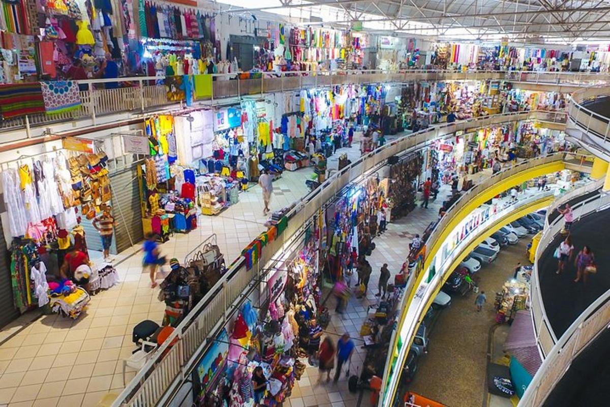 an overhead view of a shopping mall filled with people