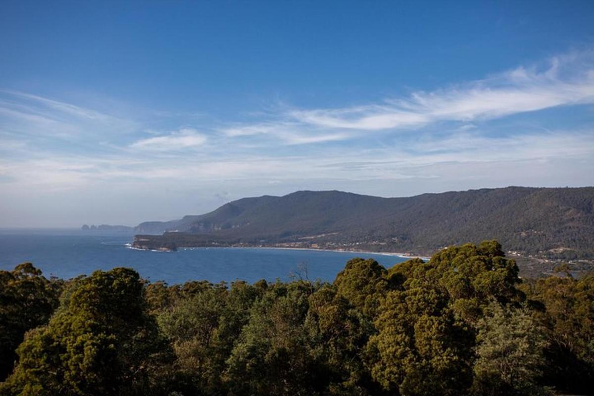 a view of a body of water with mountains