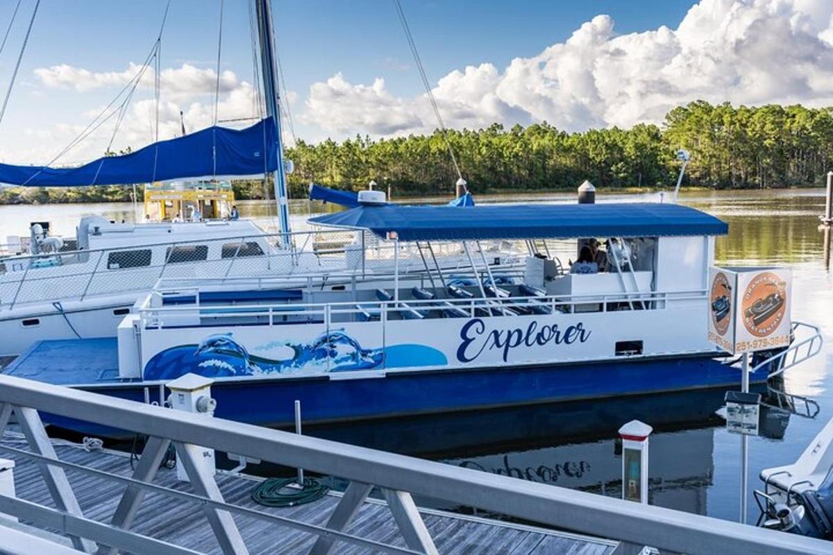 a boat is docked at a dock in the water