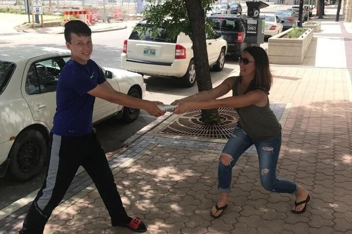 a man and a woman are holding hands