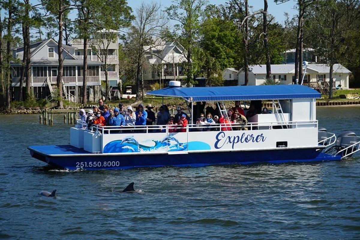 a group of people on a boat in the water