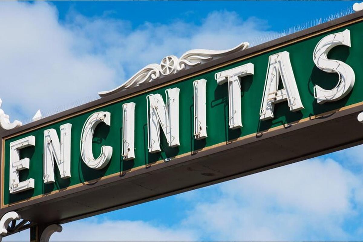 a green and white sign for a restaurant