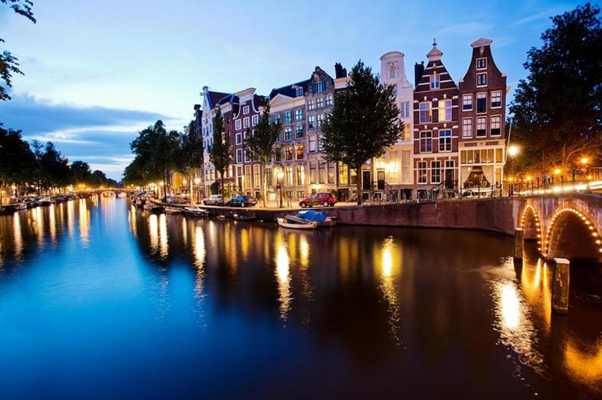 a view of a river with buildings and a bridge