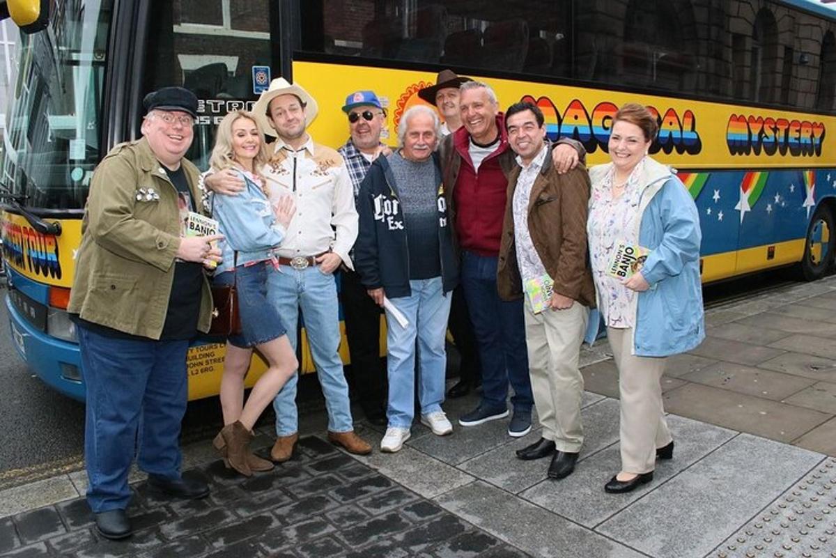 a group of people standing in front of a bus