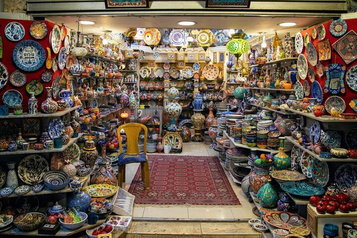 a store filled with lots of pottery on display
