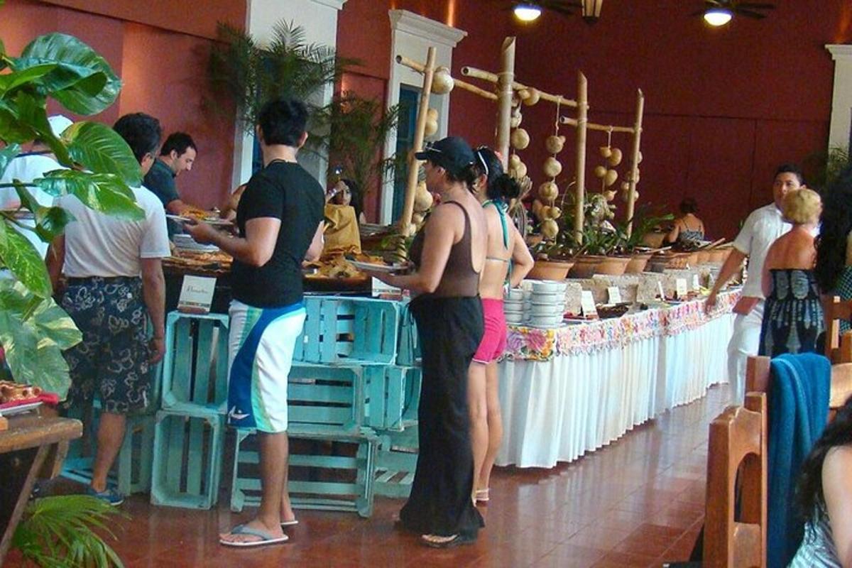a group of people standing around a buffet line