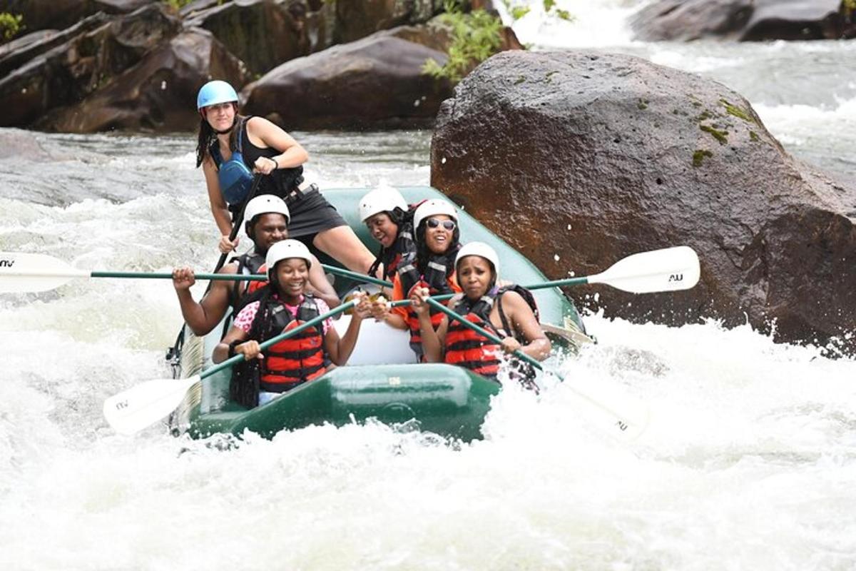 a group of people are rafting on a river