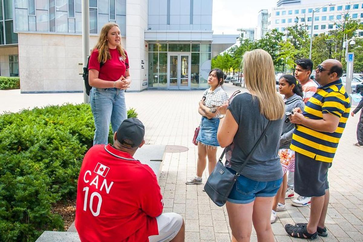a group of people standing around in front of a building