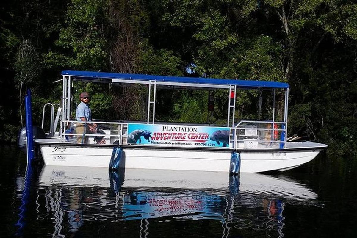 a man and a dog on a boat on the water