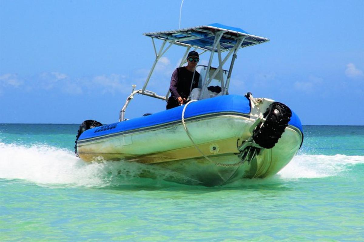 a man in a boat in the water