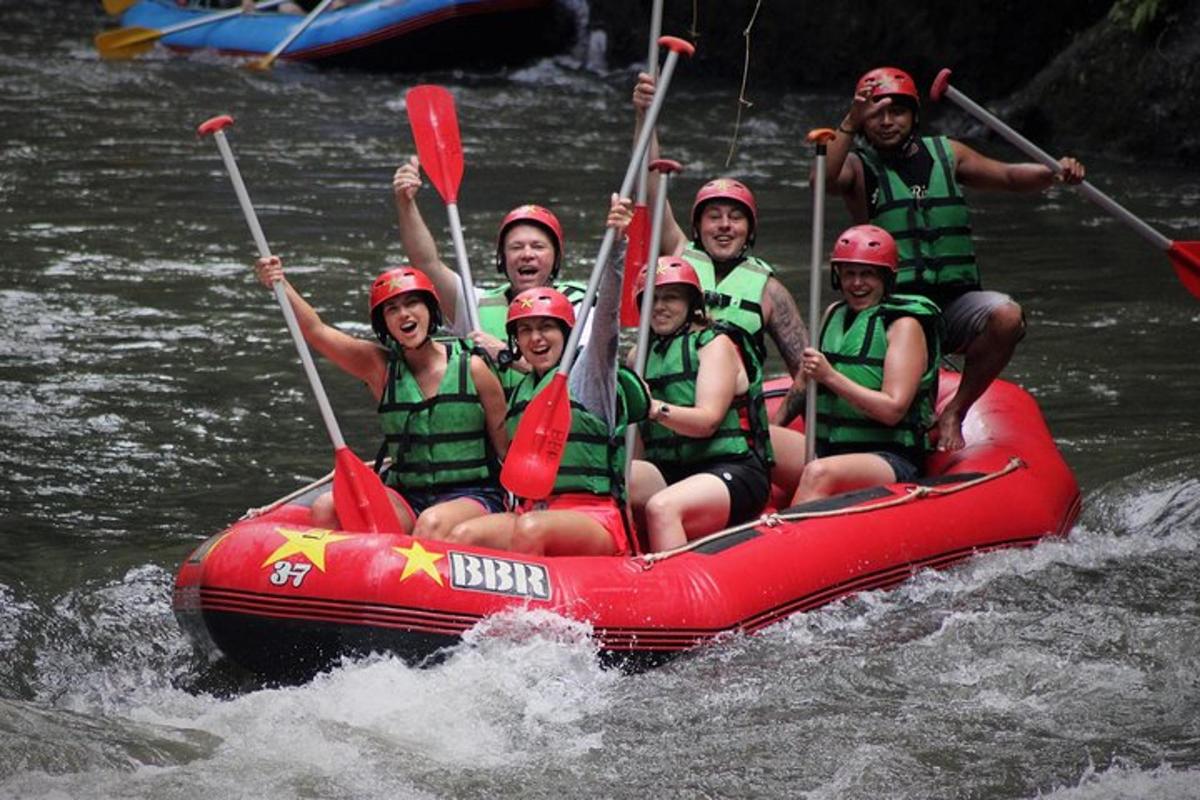 a group of people in a raft on a river
