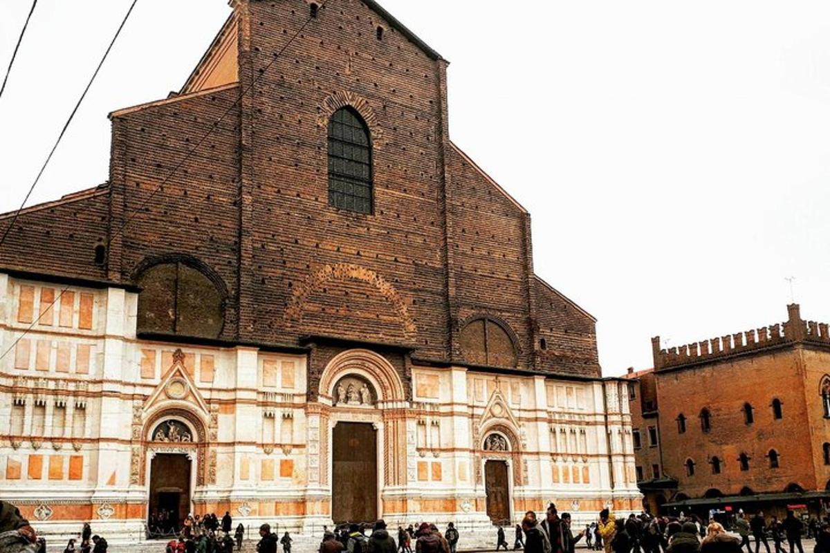a large church with people standing in front of it
