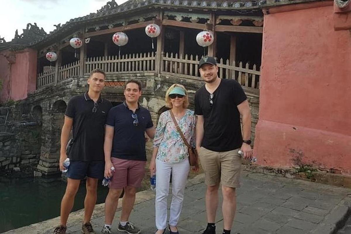 a group of people standing in front of a building