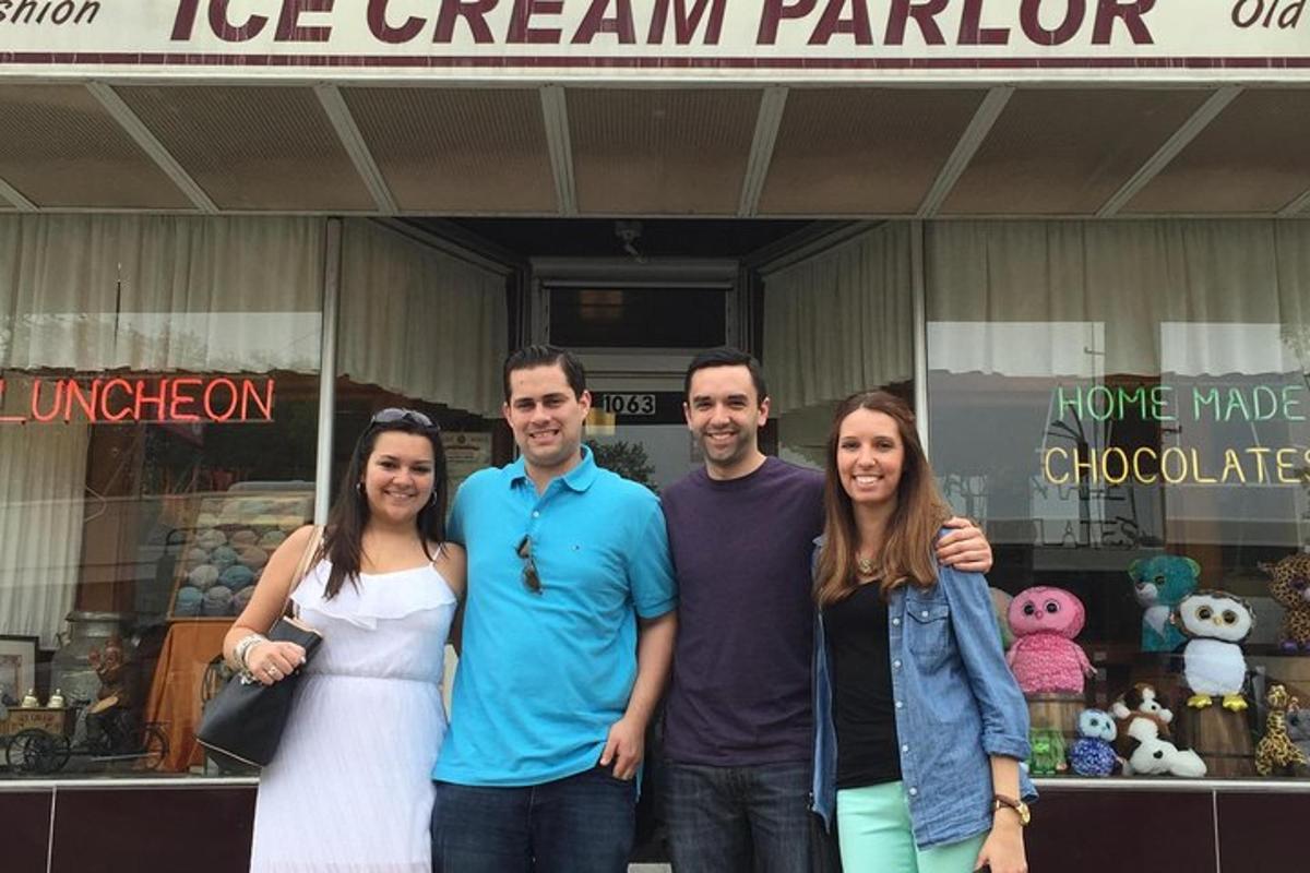 a group of people standing in front of a store