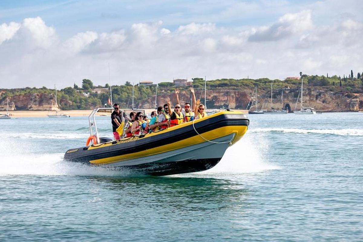 a group of people on a boat in the water