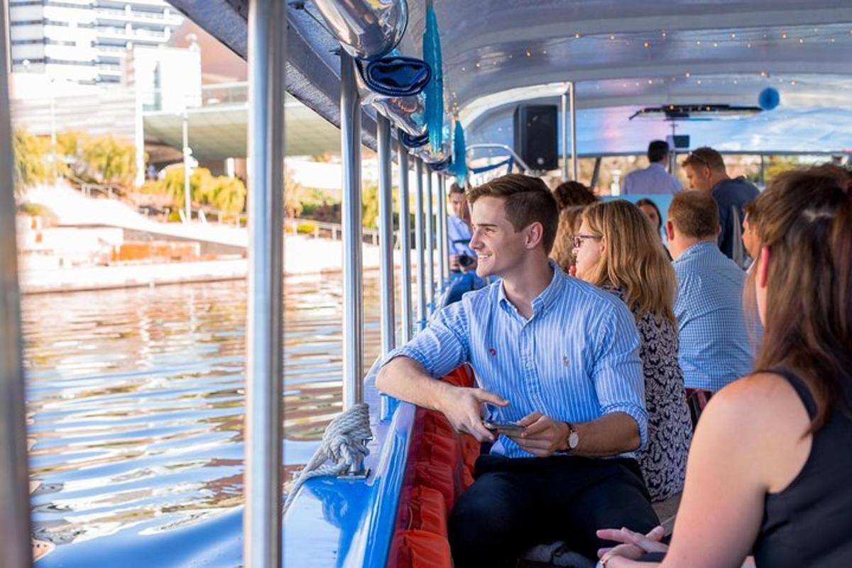 a group of people riding on a boat in the water
