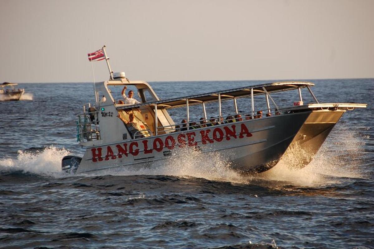 a boat in the water with people on it