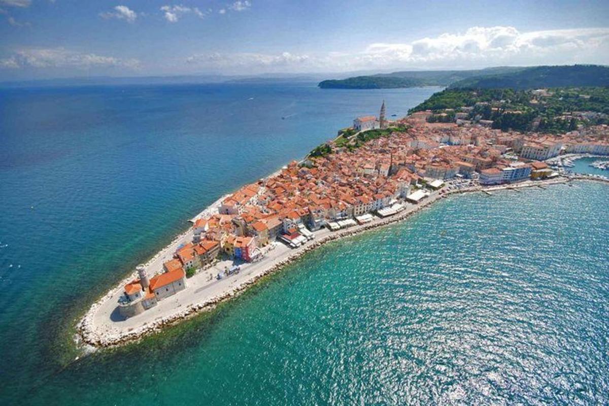 an aerial view of an island in the water