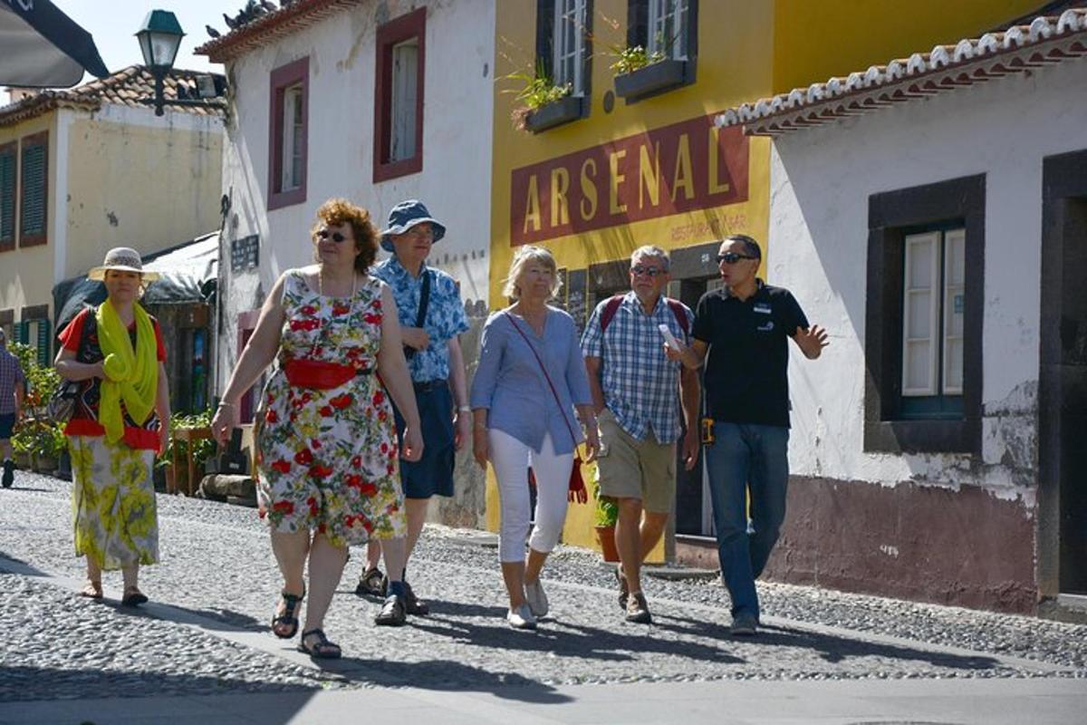 a group of people walking down a street